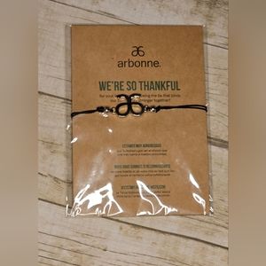 [ARBONNE] Brand Logo Bracelet Silver Tone, Black Twine Band